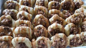 Kolaches filled with caramel, chocolate and pecans