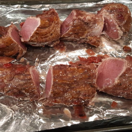 Slice pork loin into sections for more even roasting.