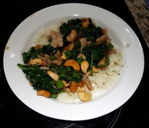 Cashew Chicken and Spinach over Lemongrass Grits