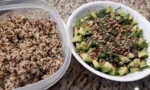 Cooked quinoa used in a salad bowl.