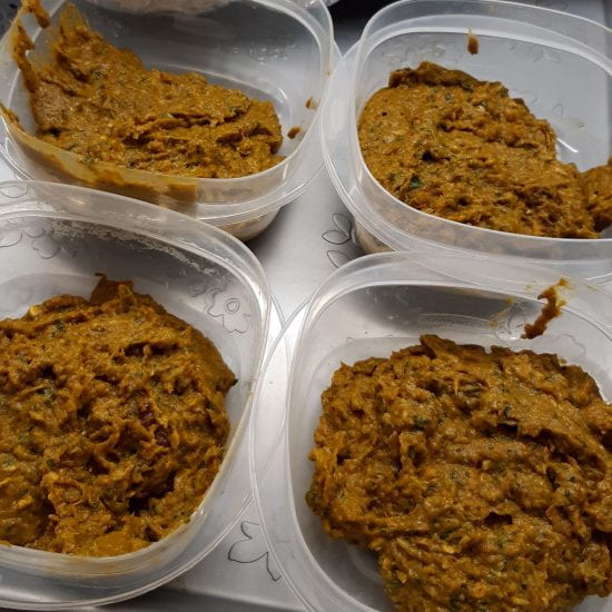 Four portions of home-made curry paste.
