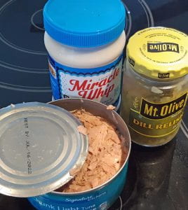 Squeeze excess water from can of tuna before adding other ingredients.