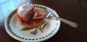 A single gluten free, lactose free strawberry cupcake
